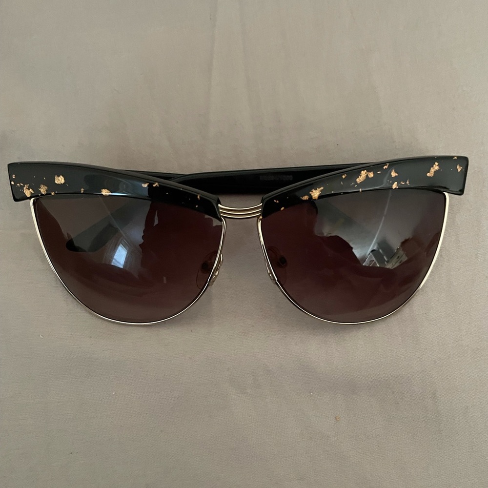 Dior aviator/cat style sunglasses.